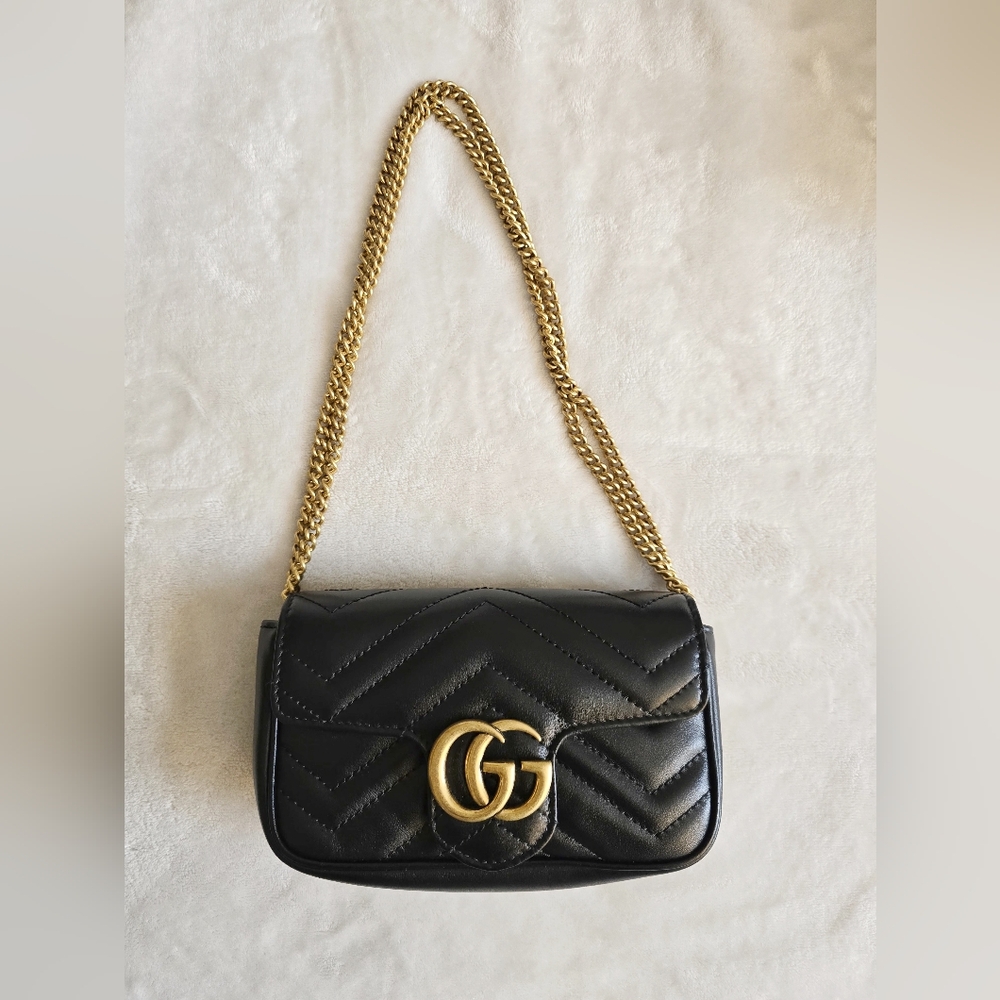 SOLD Gucci GG Marmont Matelassé leather super mini bag.